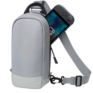 image:imageJETech Sling Bag for Nintendo Switch 2Switch OLEDSwitch Console Black  Crossbody Carrying Design 8 Game Card Slots Large Storage Capacity TravelFriendly OrganizationGrey